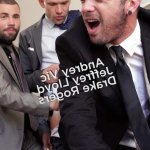 two men in suits fuck a third at the office Video