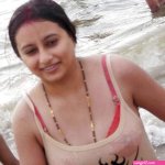 Indian Women bathing at sea ganga