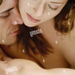 Man kissing sensual nude woman topless foreplay Stock Photo