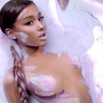 Ariana Grande Reposts Deleted Painted Topless Photo