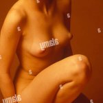 naked studio shot of young woman Stock Photo