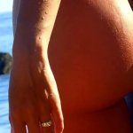 Emily Ratajkowski flaunts her incredible curves in barely-there bikini at the beach as she posts then deletes sexy snaps