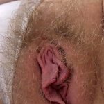 Hairy pussy and clitoris closeup. Mature bbw gently fingering vagina. Amateur.