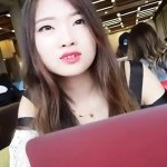 Cute Asian Girl With Remote Vibe Outside