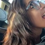 Horny brunette in glasses gives a blowjob to her manager in the parking lot