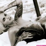 Ruby Rose nude photo shoots showing her naked tattooed body and boobs.. Rating 7.3610