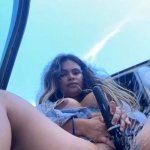 Huge squirt in public next to her car