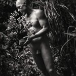 Male nude with plant Photography by Peter Zelei