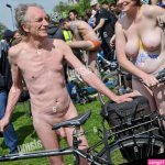 Naked couple cyclists at the Wellington Arch World Naked Bike Ride 2012 London England UK Stock Photo