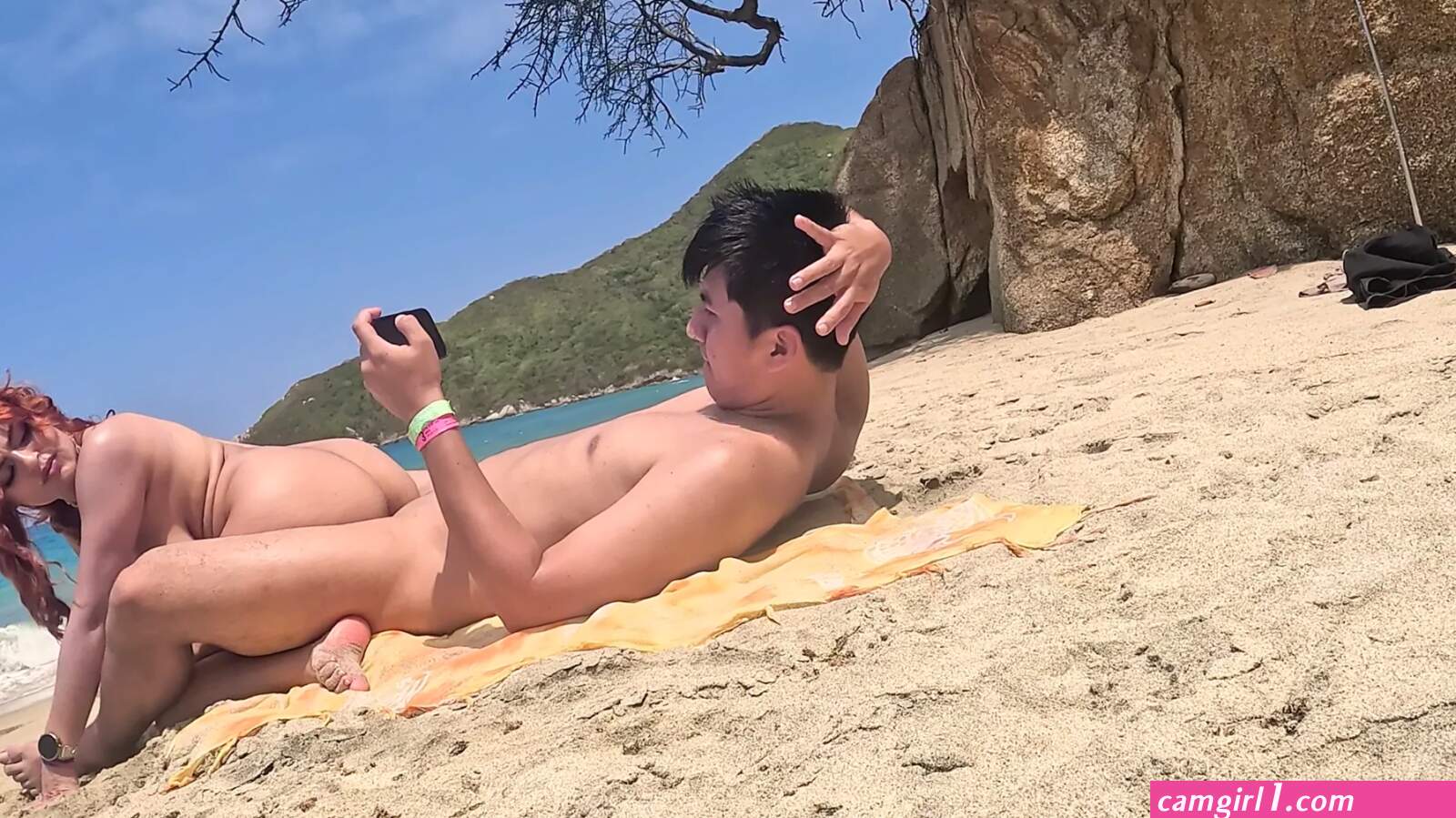 Couple masturbating on beach (photos)